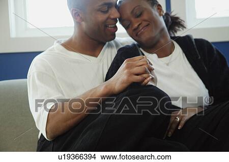 Picture - Loving couple holding hands. Fotosearch