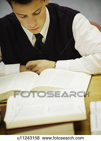 Male student working View Large Photo Image Stock Photo - Male student working. Fotosearch