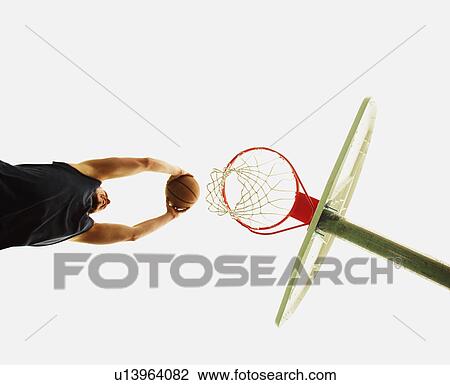 Man playing basketball View Large Photo Image Stock Image - Man playing basketball. Fotosearch