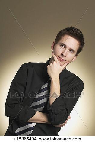 Man thinks View Large Photo Image Picture - Man thinks. Fotosearch