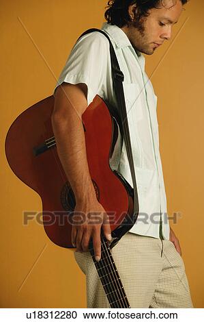 Stock Image - Man with a guitar. Fotosearch