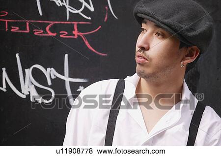 Stock Photo - Man with a hat. Fotosearch