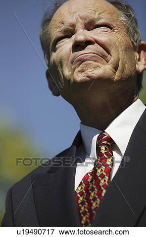 Stock Photo - Man with a worried expression. Fotosearch