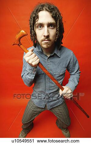 Man with cane View Large Photo Image Stock Image - Man with cane. Fotosearch