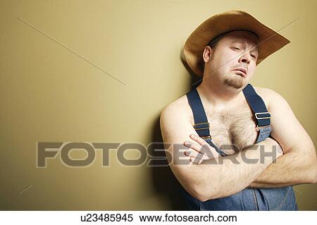 Stock Photography - Man with cowboy hat. Fotosearch