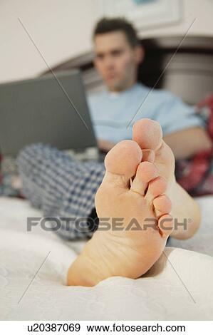 Man working from home View Large Photo Image Stock Photo - Man working from home. Fotosearch