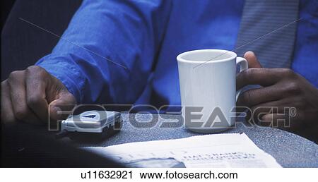 Meeting over coffee View Large Photo Image Stock Image - Meeting over coffee. Fotosearch