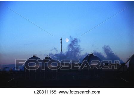 Moonrise over industrial facility View Large Photo Image Stock Photography - Moonrise over industrial facility. Fotosearch