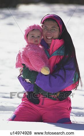 Mother and daughter outside in winter View Large Photo Image Stock Photo - Mother and daughter outside in winter. Fotosearch