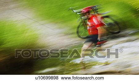 Stock Photo - Mountain biker. Fotosearch