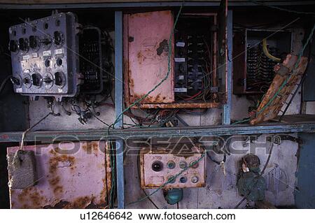 Stock Image - Obsolete old control boxes. Fotosearch