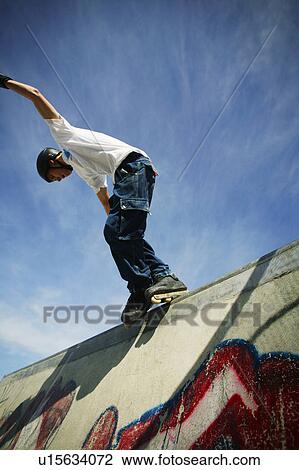 Stock Image - On the edge. Fotosearch