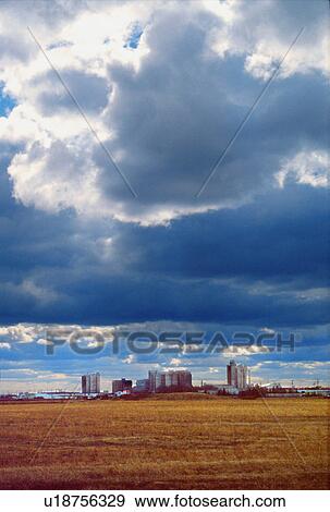 Stock Photo - Overcast sky over factory. Fotosearch