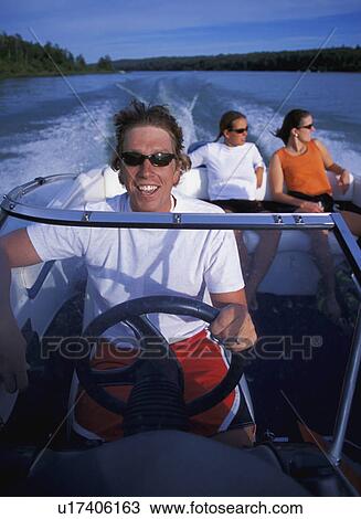 People on speedboat from bow of boat View Large Photo Image Stock Image - People on speedboat from bow of boat. Fotosearch