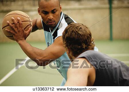Playing basketball View Large Photo Image Stock Image - Playing basketball. Fotosearch