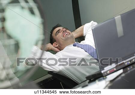Stock Photography - Pleased businessman. Fotosearch