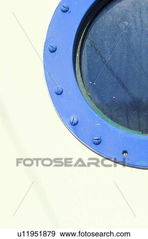 Stock Photo - Porthole on blue and white boat. Fotosearch