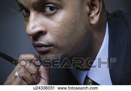 Stock Image - Portrait of a businessman. Fotosearch