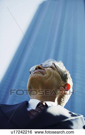 Portrait of a businessman View Large Photo Image Stock Photograph - Portrait of a businessman. Fotosearch