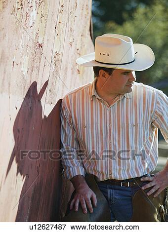 Stock Photo - Portrait of a cowboy. Fotosearch