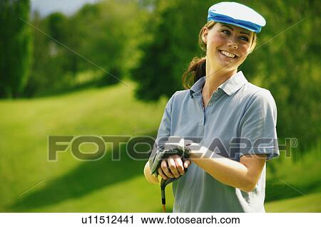 Stock Image - Portrait of a golfer. Fotosearch