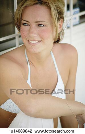 Stock Image - Portrait of a woman in a bathing suit. Fotosearch