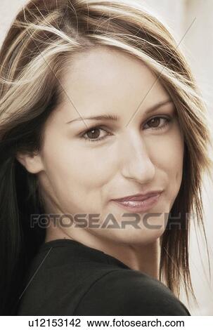 Stock Image - Portrait of a woman's face. Fotosearch
