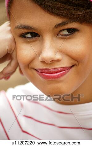 Portrait of a young woman View Large Photo Image Stock Image - Portrait of a young woman. Fotosearch