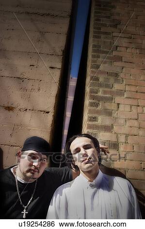 Portrait of two tough guys View Large Photo Image Stock Photograph - Portrait of two tough guys. Fotosearch
