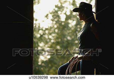 Profile of a cowgirl View Large Photo Image Stock Photo - Profile of a cowgirl. Fotosearch