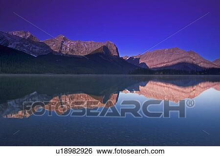 Reflections on Upper Kananaskis Lake, Kananaskis Country Alberta, Canada View Large Photo Image Stock Photograph - Reflections on Upper Kananaskis Lake, Kananaskis Country Alberta, Canada. Fotosearch