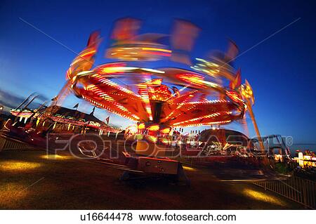 Stock Photo - Ride at an amusement park. Fotosearch