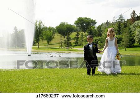 Stock Photo - Ring barer and flower girl. Fotosearch