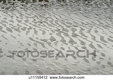 Stock Image - Ripples in water. Fotosearch