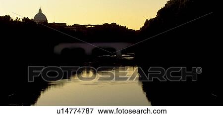 Stock Photo - River through Rome at sunset. Fotosearch