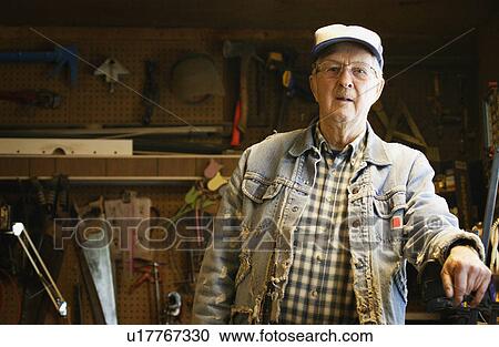 Senior in a workshop View Large Photo Image Stock Image - Senior in a workshop. Fotosearch