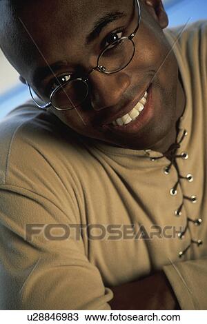 Stock Image - Smiling man. Fotosearch