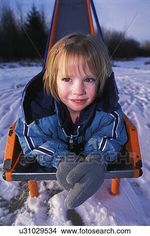 Picture - Smiling on the bottom of a slide. Fotosearch