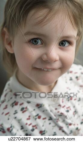 Stock Photo - Smiling two front teeth. Fotosearch