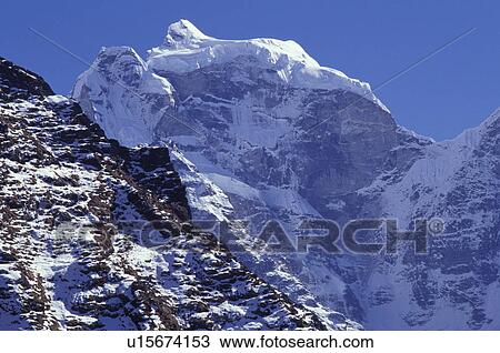 Snow on mountain peaks View Large Photo Image Stock Image - Snow on mountain peaks. Fotosearch