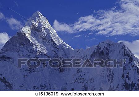 Snowy mountain peaks View Large Photo Image Stock Photo - Snowy mountain peaks. Fotosearch