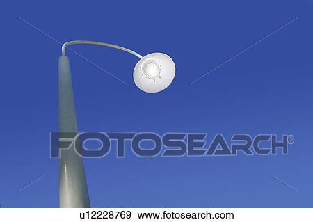 Street lamp against blue sky View Large Photo Image Stock Photo - Street lamp against blue sky. Fotosearch