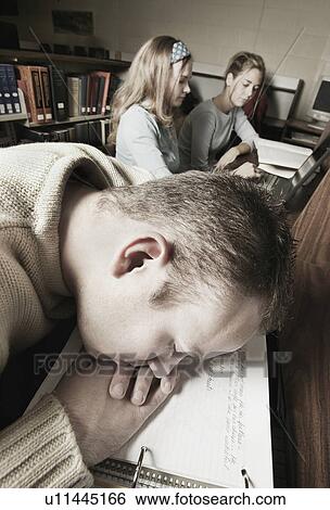 Student falls asleep on notes View Large Photo Image Stock Photograph - Student falls asleep on notes. Fotosearch