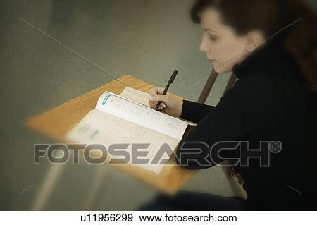Stock Photo - Student in class. Fotosearch