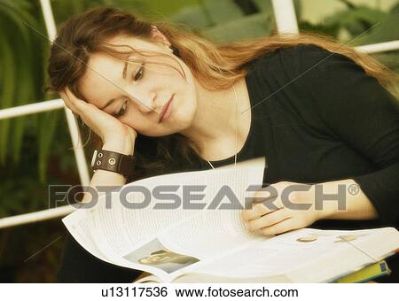 Student reads View Large Photo Image Stock Photograph - Student reads. Fotosearch