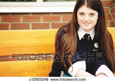 Student sitting alone View Large Photo Image Stock Photo - Student sitting alone. Fotosearch