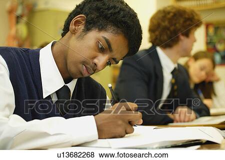 Stock Photo - Students in classroom. Fotosearch