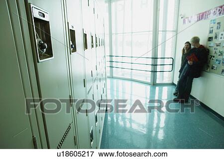 Students lounge in hallway View Large Photo Image Stock Photo - Students lounge in hallway. Fotosearch