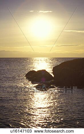 Sun shining on water View Large Photo Image Stock Image - Sun shining on water. Fotosearch
