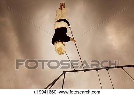 Swinging on a swing View Large Photo Image Stock Image - Swinging on a swing. Fotosearch